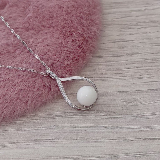 Perle de lait maternel sur un pendentif en argent925 